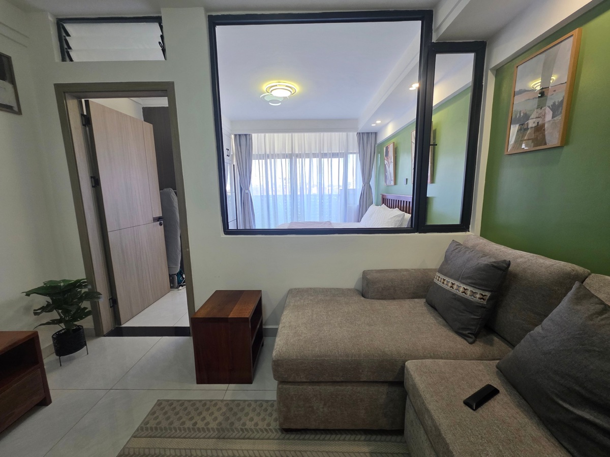 Living room with bedroom view